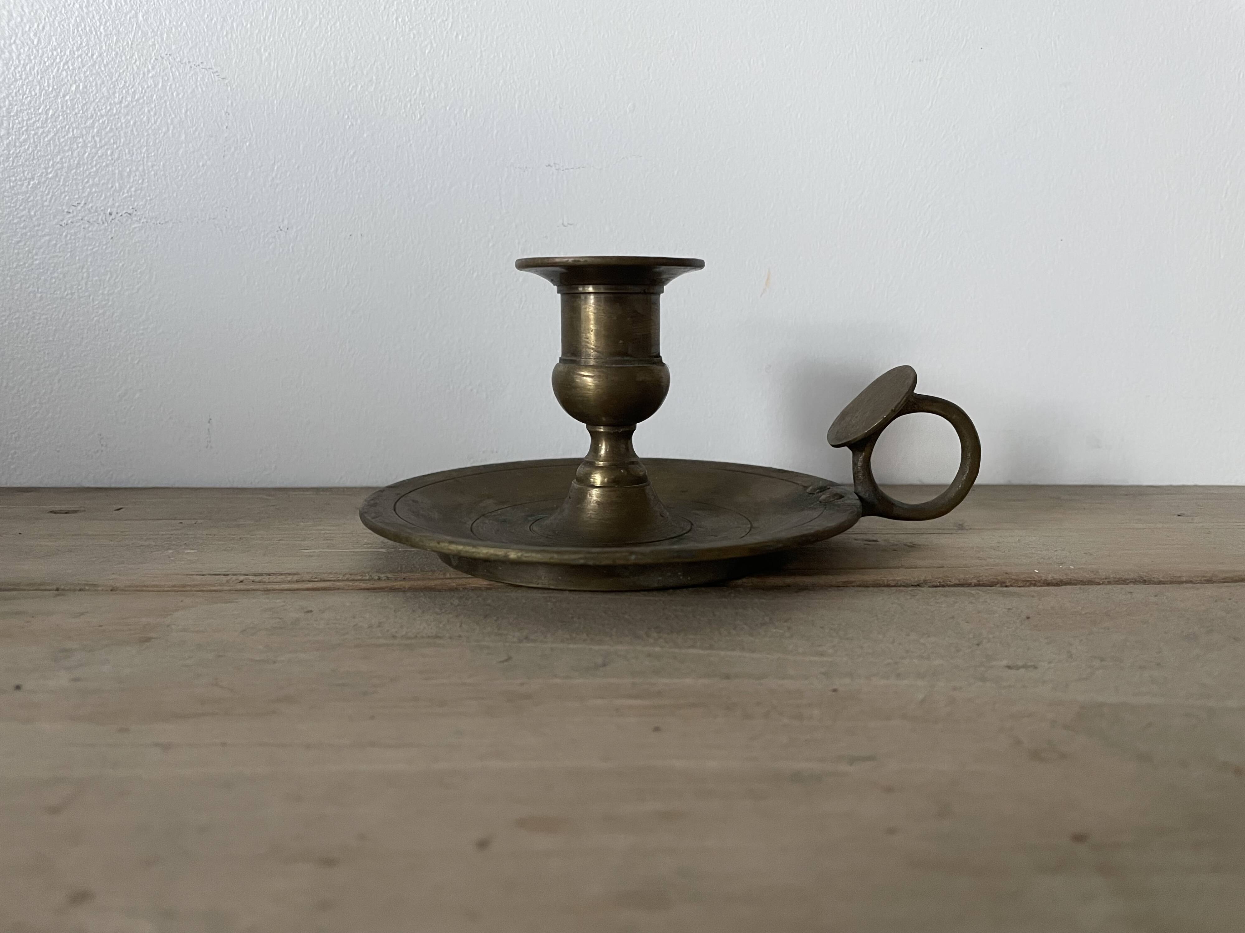 Old brass candle holder