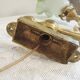 Bronze wall lamp with green tulip