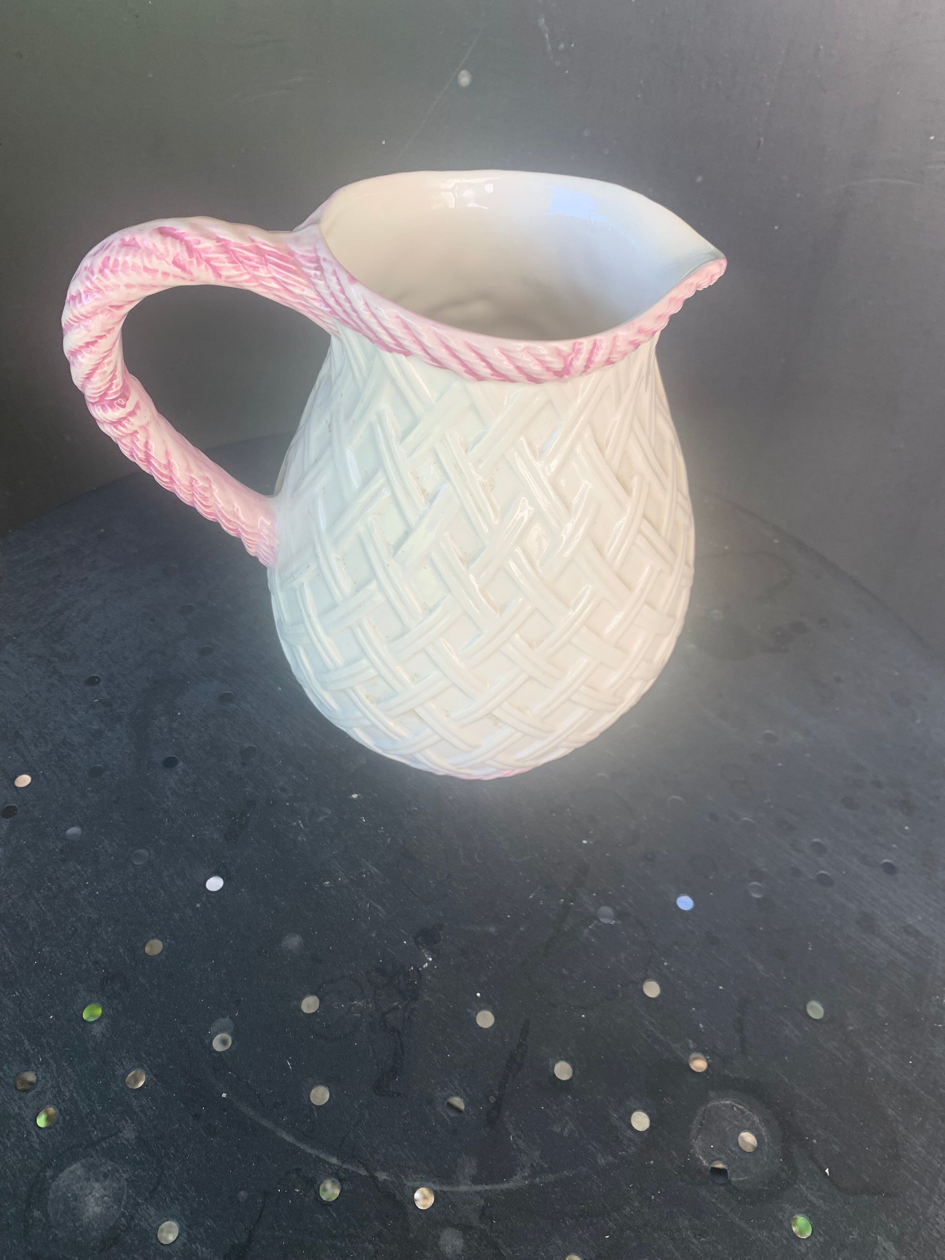 Glazed ceramic slip jug with vintage basket and fruit motif