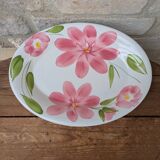 Oval serving dish with hand-painted pink flowers in San Marciano ceramic.