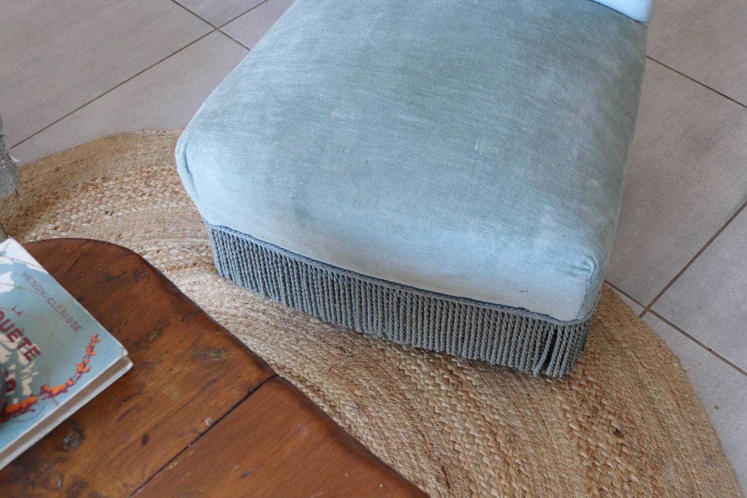 Vintage blue velvet fringed armchair.