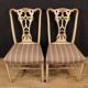Paire de chaises italiennes laquées et dorées