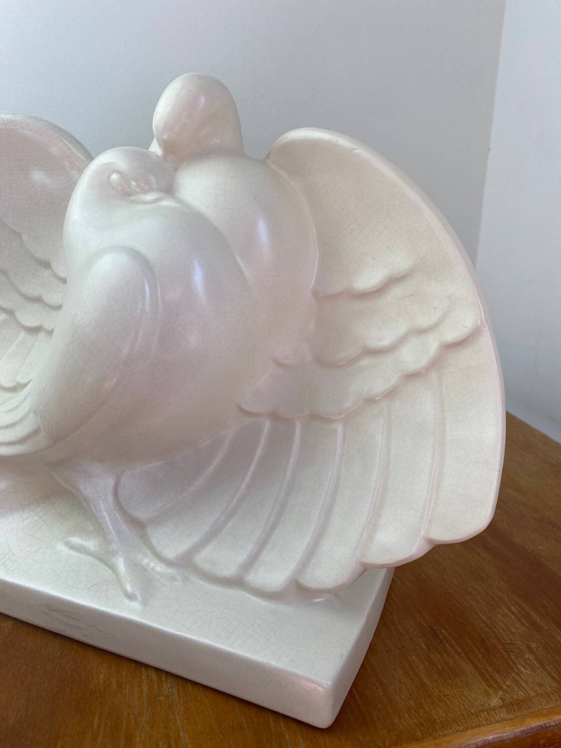 Cracked ceramic doves, signed Lejan