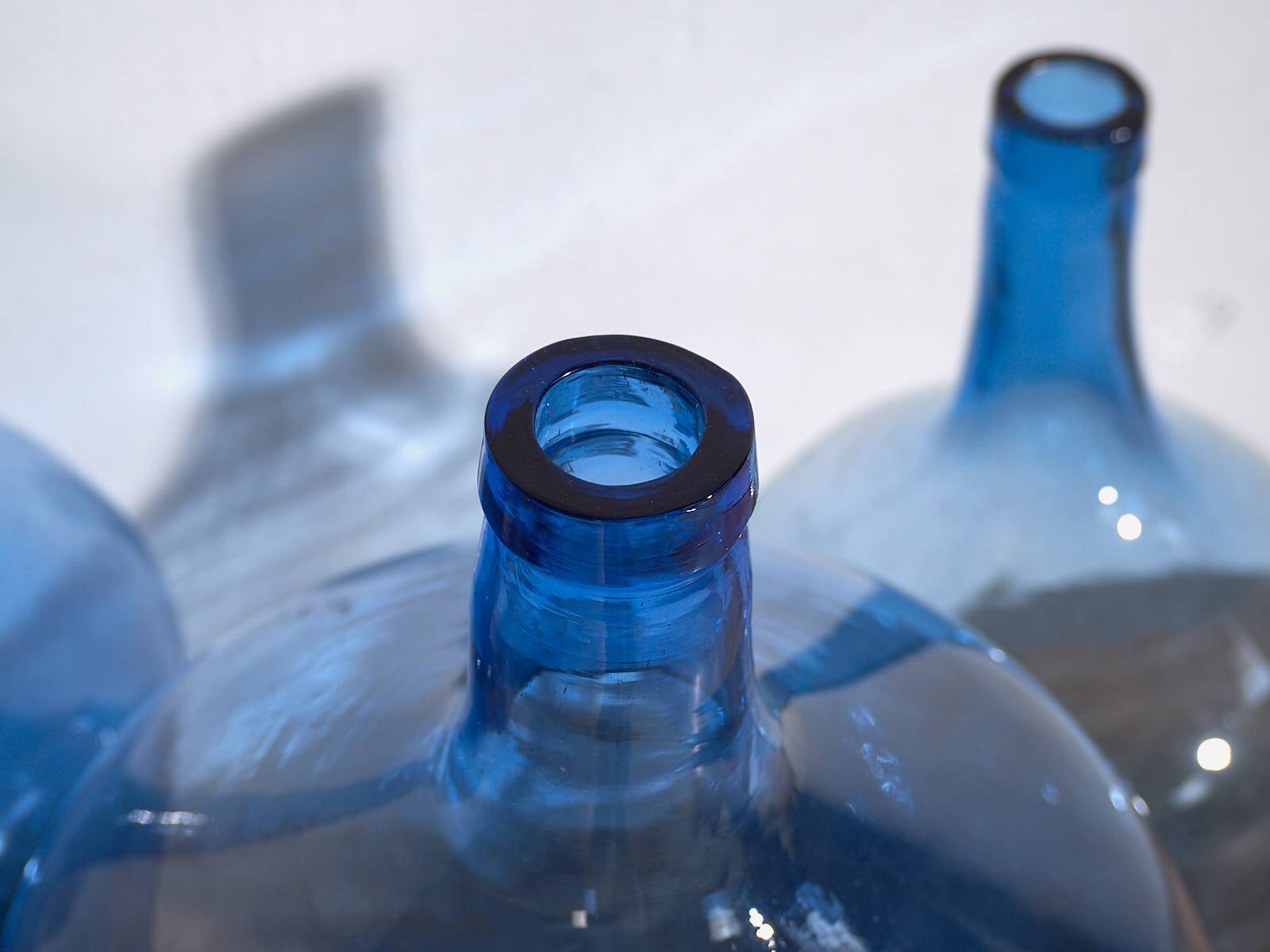 Antique blue demijohns (circa 1920). 3-piece set #1