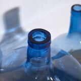 3 dame-Jeanne en verre bleu, vers 1920