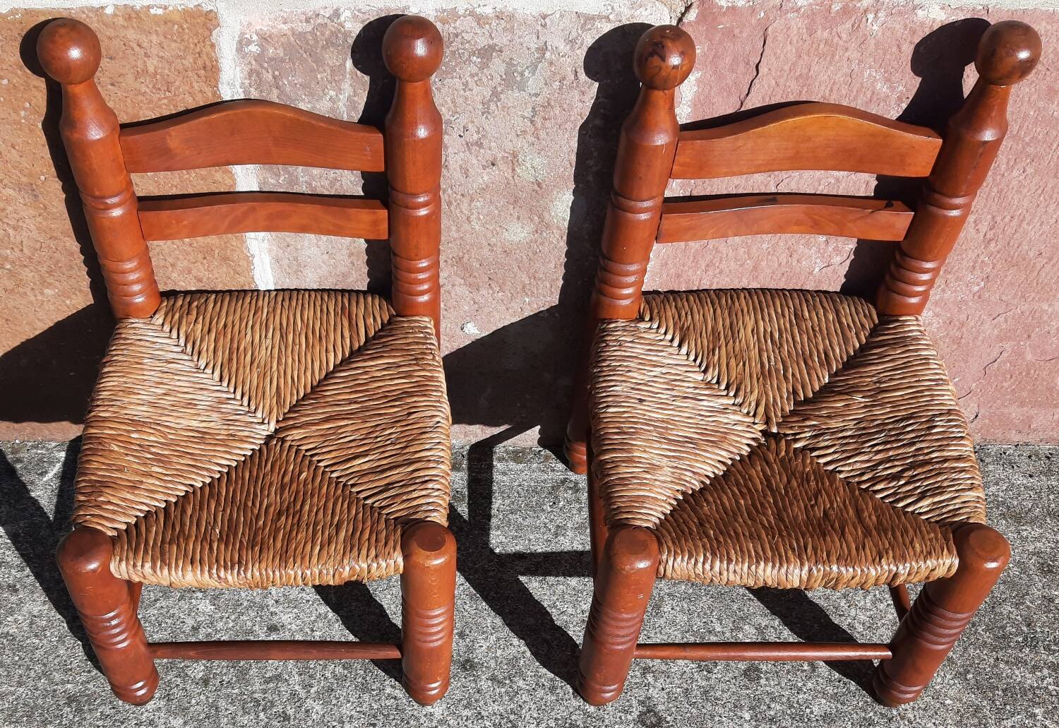 Pair of low armchairs by the fireplace. (Straw seat)