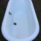 Cast iron bathtub on legs
