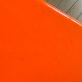 Small orange fiberglass side table from the 70s