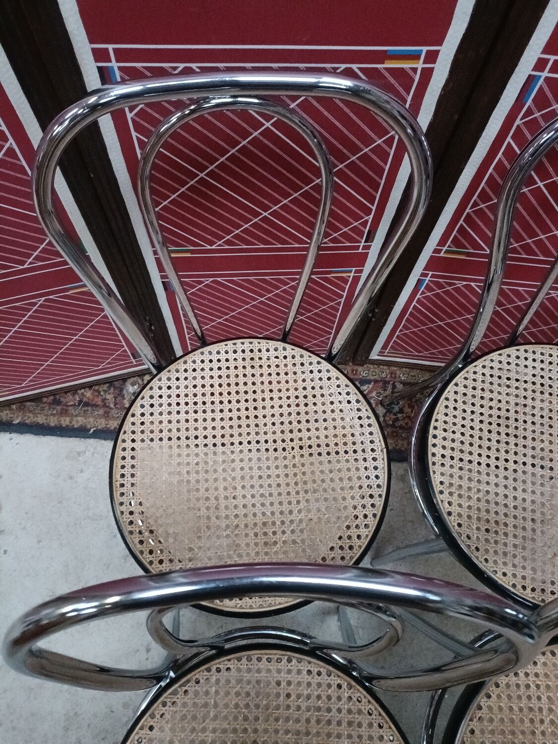 4 chaises bistrot en acier chromé et assise cannée