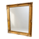 Antique mirror with a gilded frame and foliage decoration.