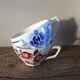 A set of 2 Digoin Sarreguemines cups with pink and blue flowers.