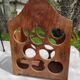 Wooden and brass bottle holder