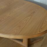 Oak oval table with extension cords
