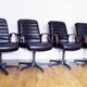 Stoll Giroflex conference chair in leather and 1960s wood