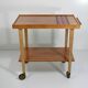 Vintage rolling bar or serving trolley, red ceramic, 1950s design