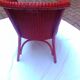 Fauteuil vintage en rotin rouge