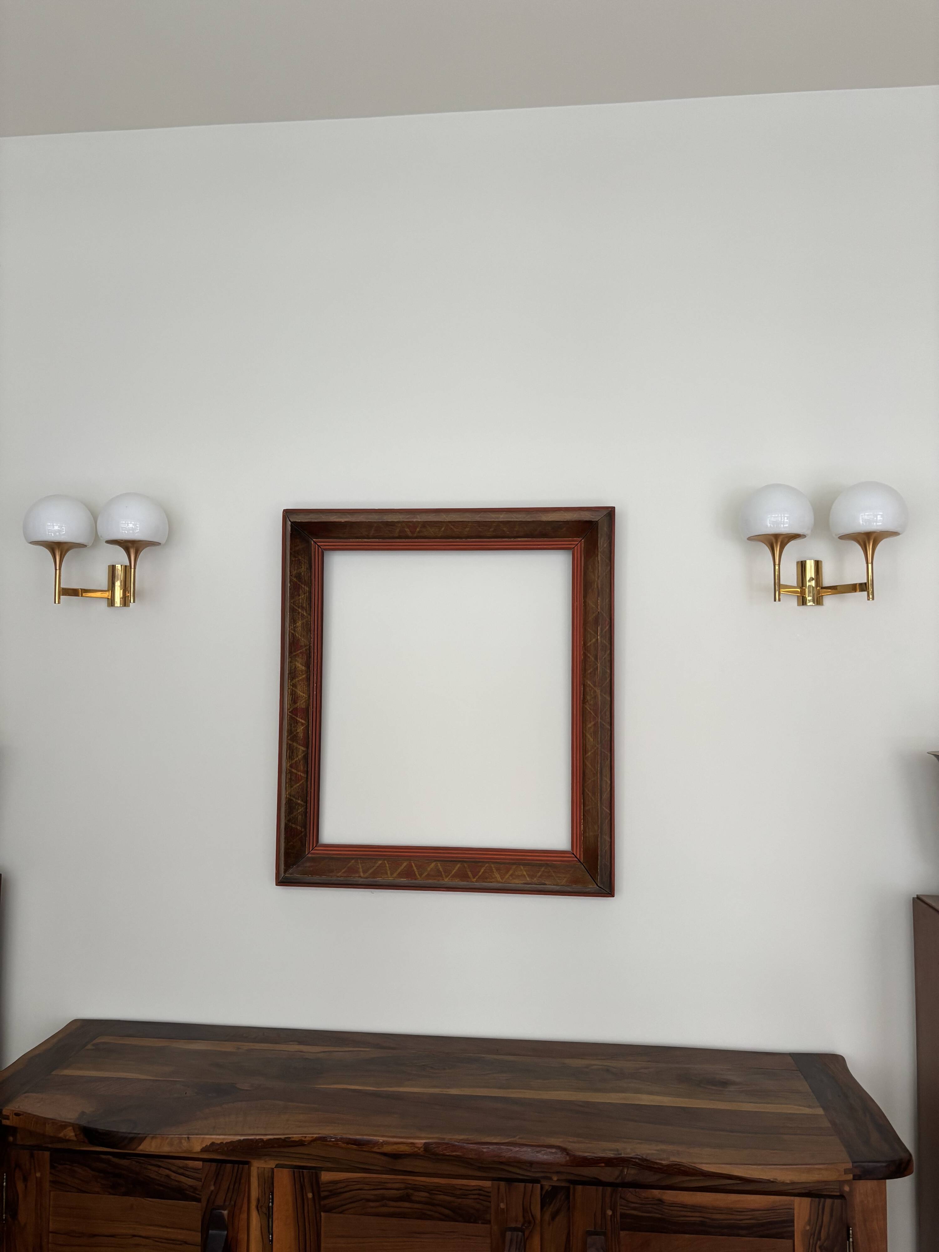 Golden metal wall light and opaline, 1970