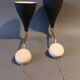 Pair of bedroom sconces in gilded brass and black aluminum 1960.