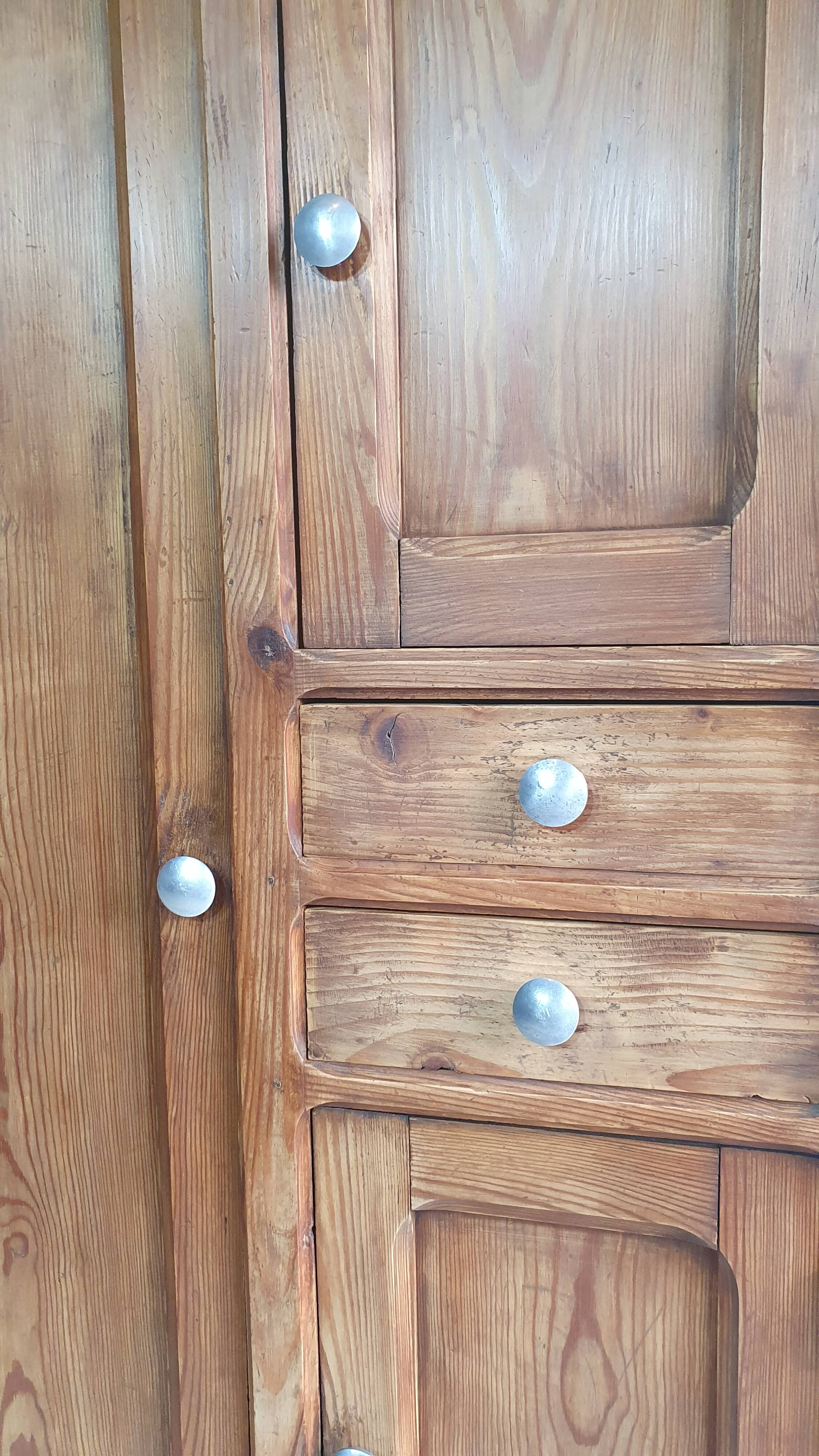 Small cabinet made of raw wood