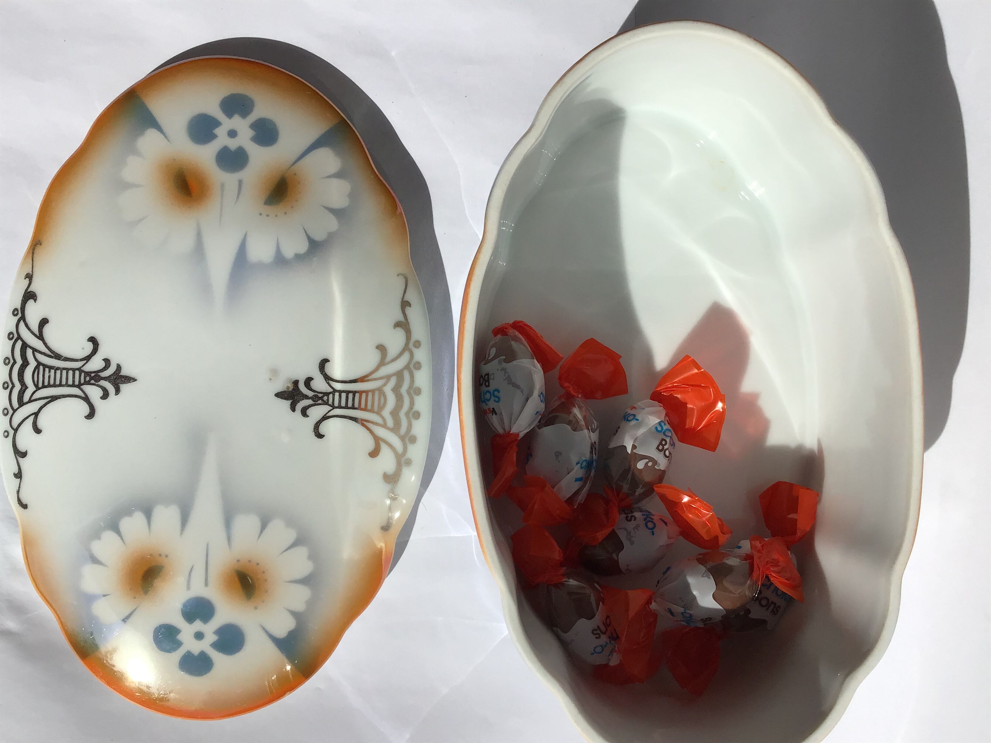 Decorated oval porcelain candy