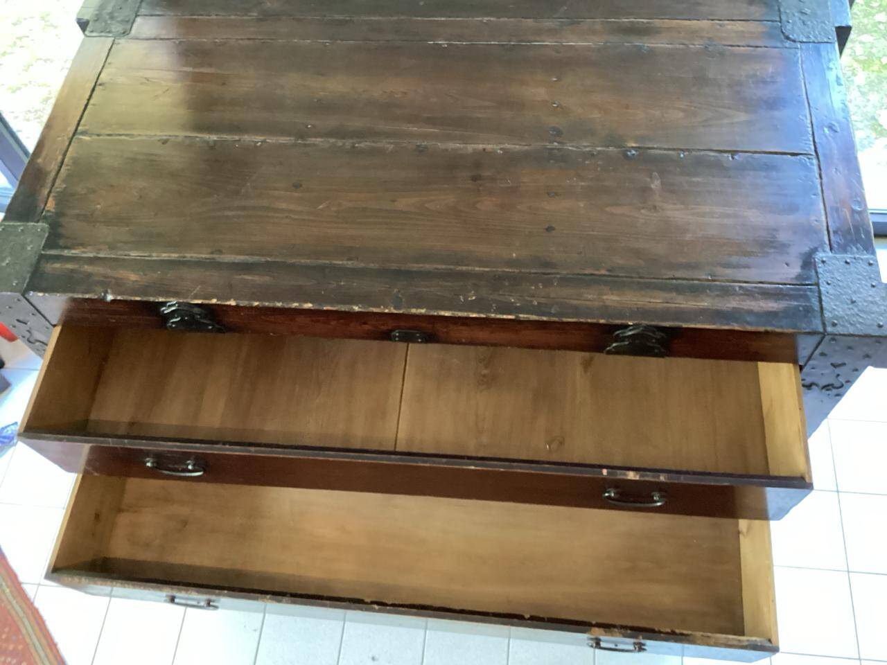Japanese antique wooden chest with black fittings.