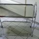 Vintage rolling trolley in smoked glass