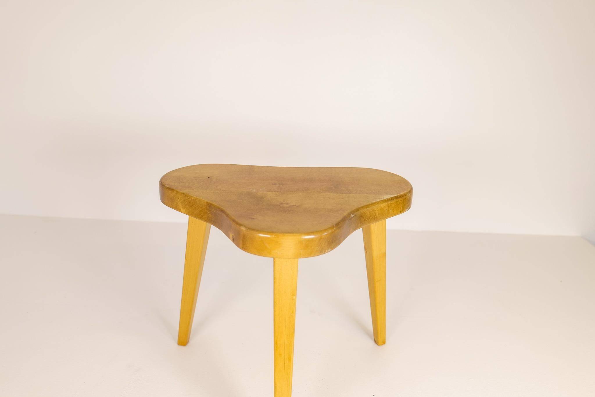 Modern Swedish Scandinavian stool in lacquered birch, 1970s.