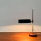 Mid-century minimalist table lamp with a teak veneer base, 1960s.