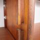 A vintage mid-century teak Gianfranco Frattini style bookcase room divider
