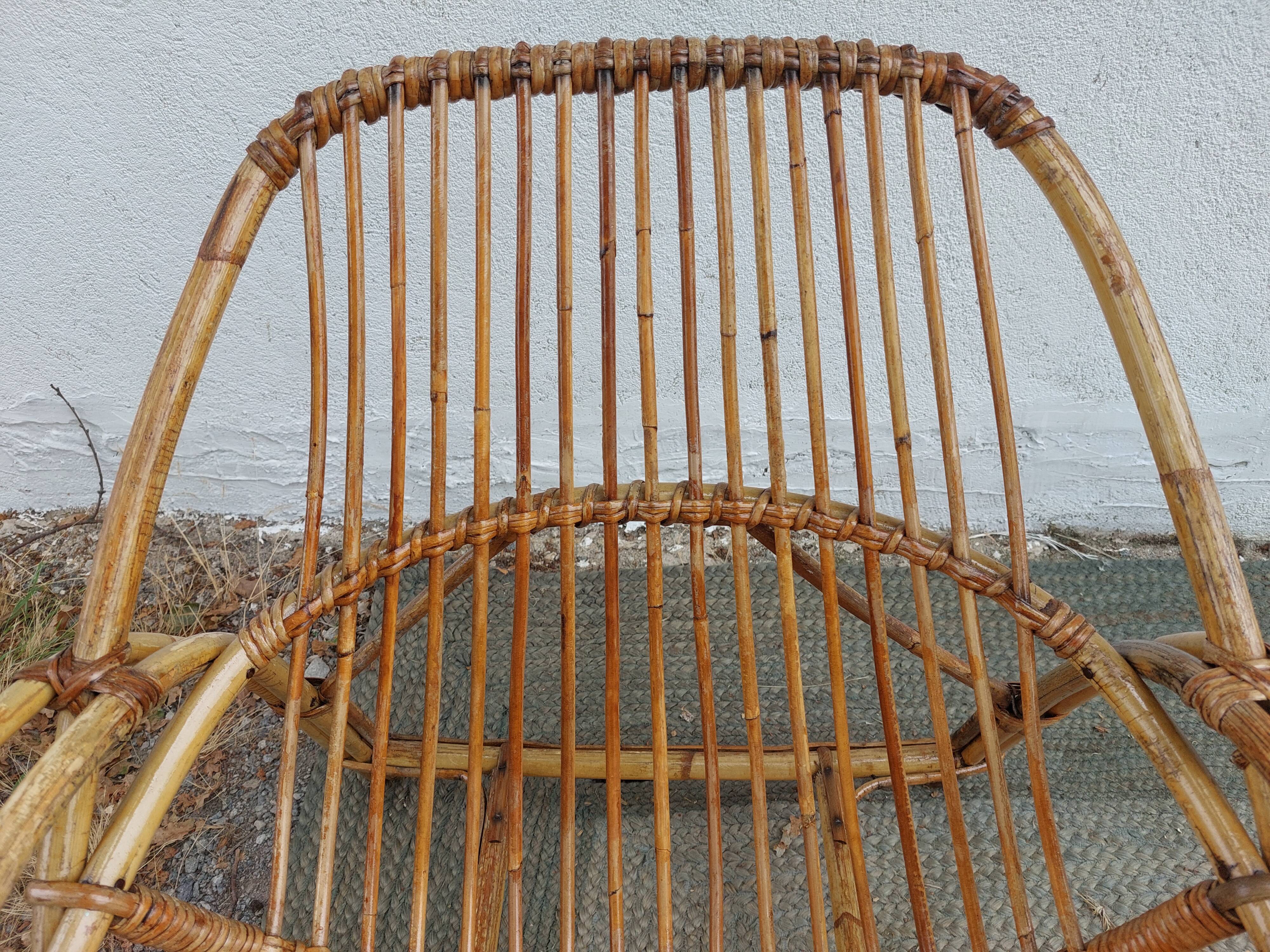 4 armchairs and a coffee table made of rattan and bamboo wood, vintage.