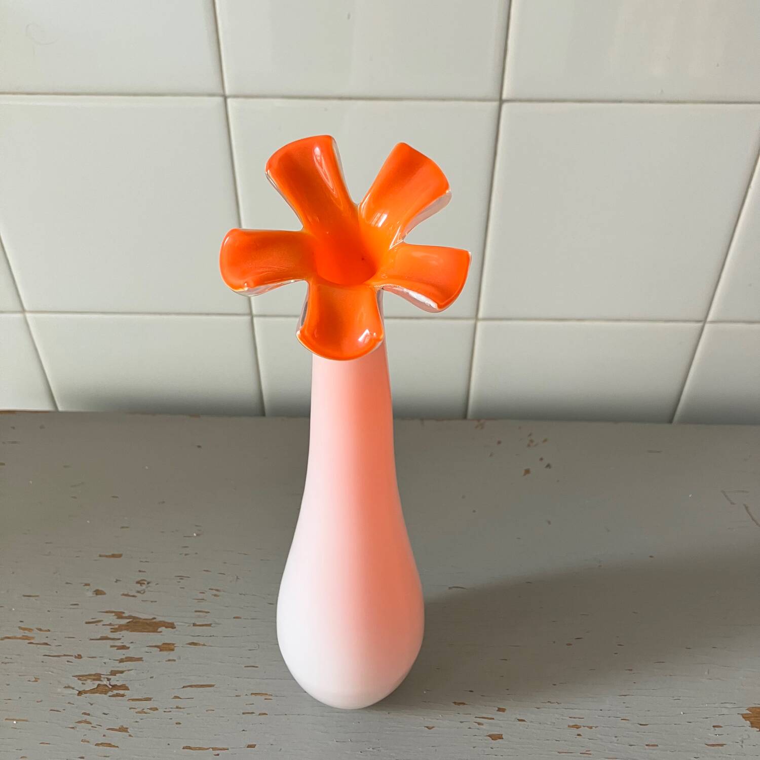 Long pink vase with petal collar