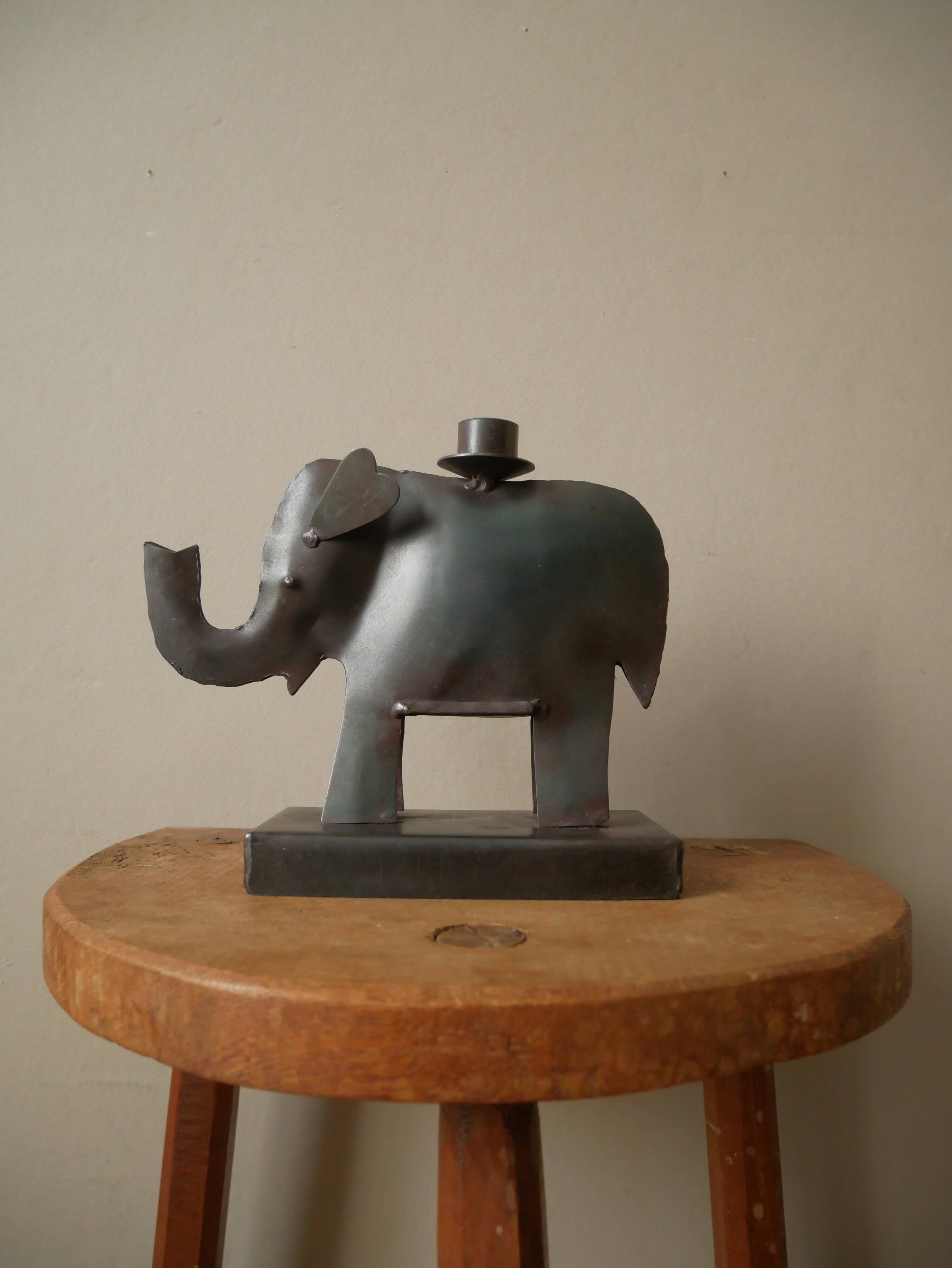 Candle holder in metal