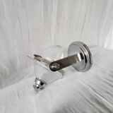 Tilting soap dispenser
