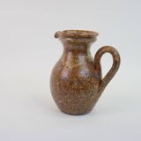 Brown speckled stoneware pitcher in very good condition