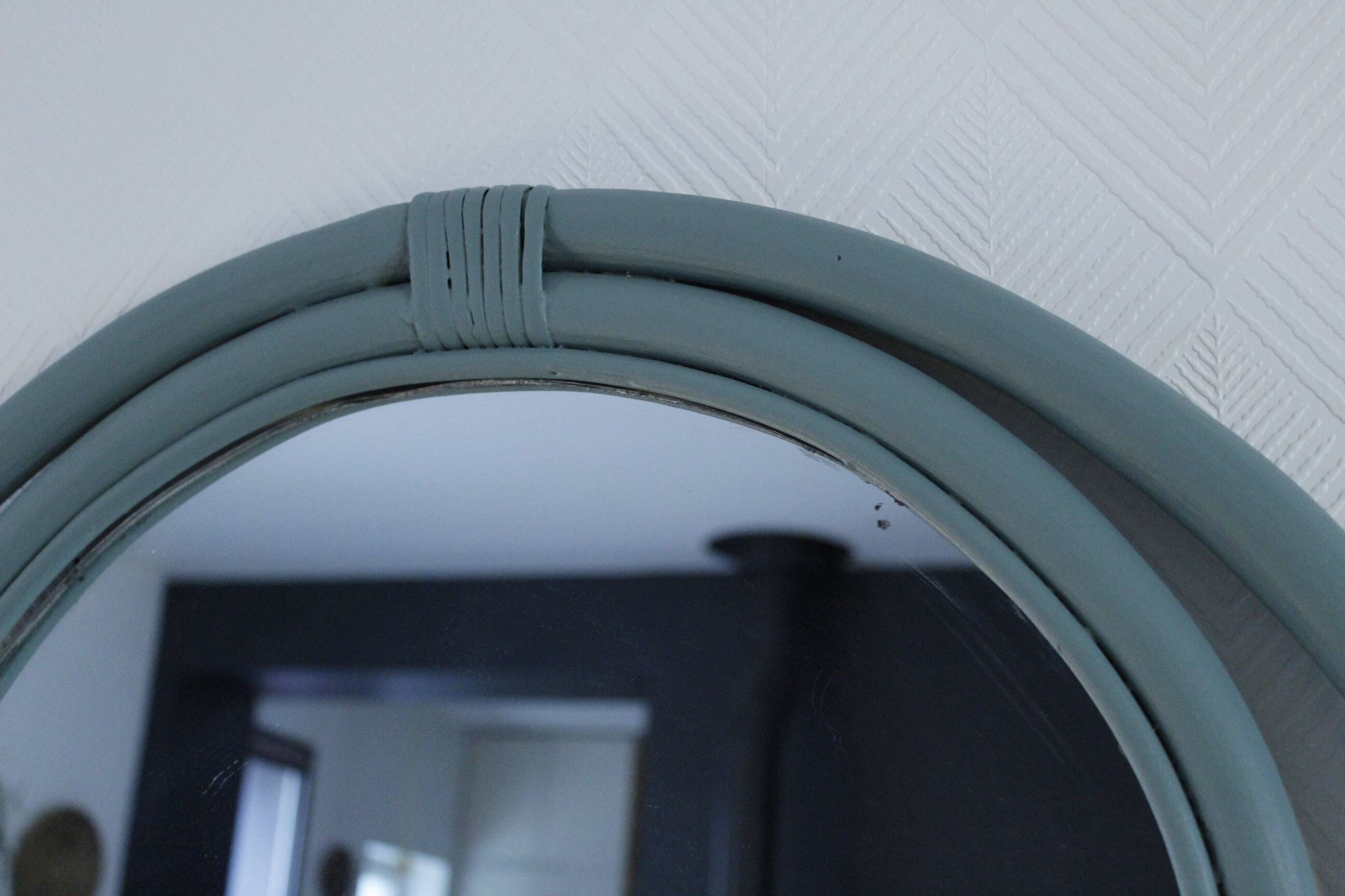 Sage green painted rattan mirror