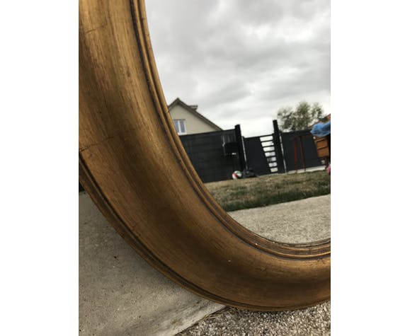 Gold oval mirror 64cm x 54cm