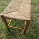 Wood and straw bench