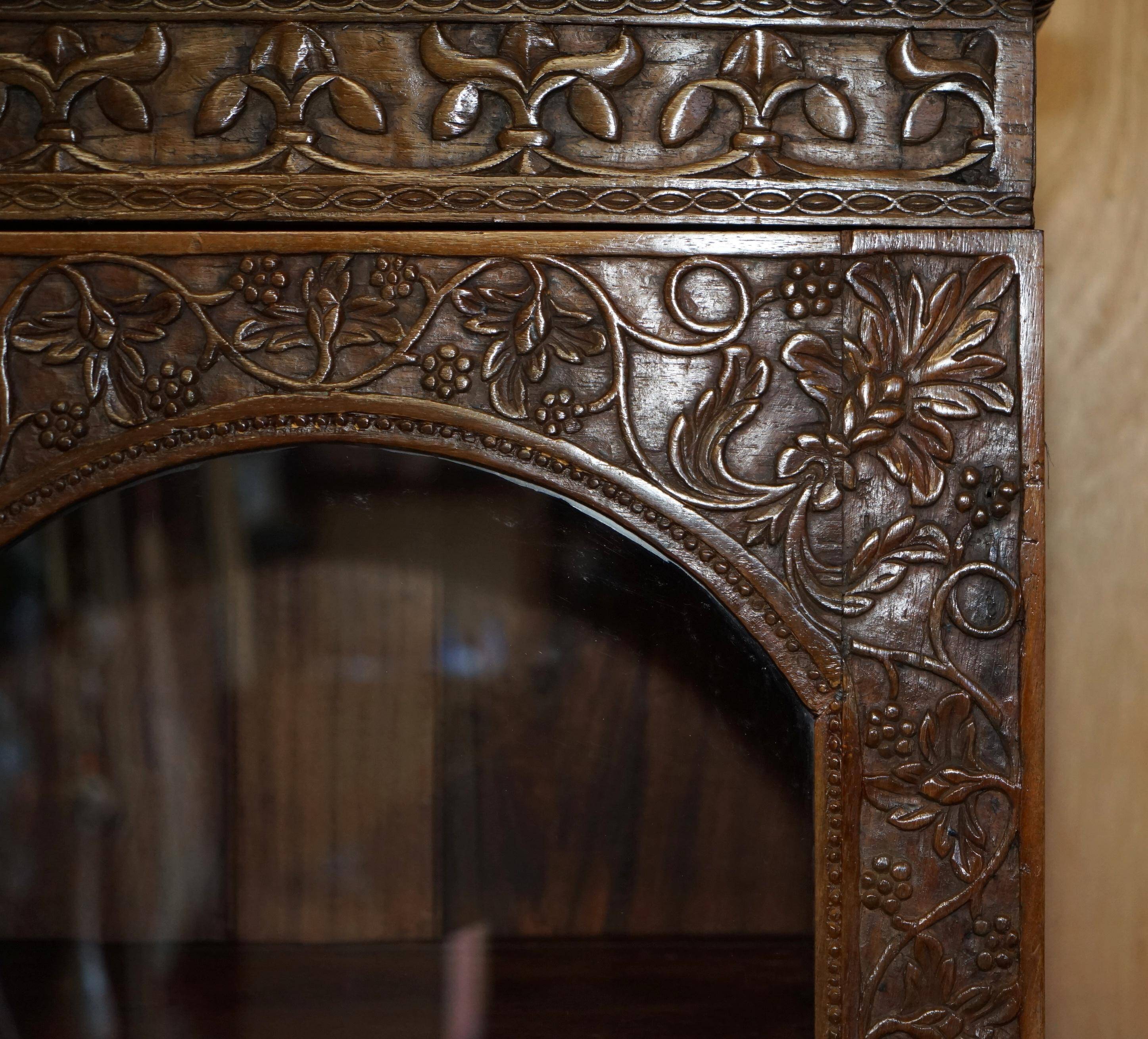 19th-century Anglo-Indian colonial hardwood library on a chest of drawers.