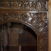 19th-century Anglo-Indian colonial hardwood library on a chest of drawers.