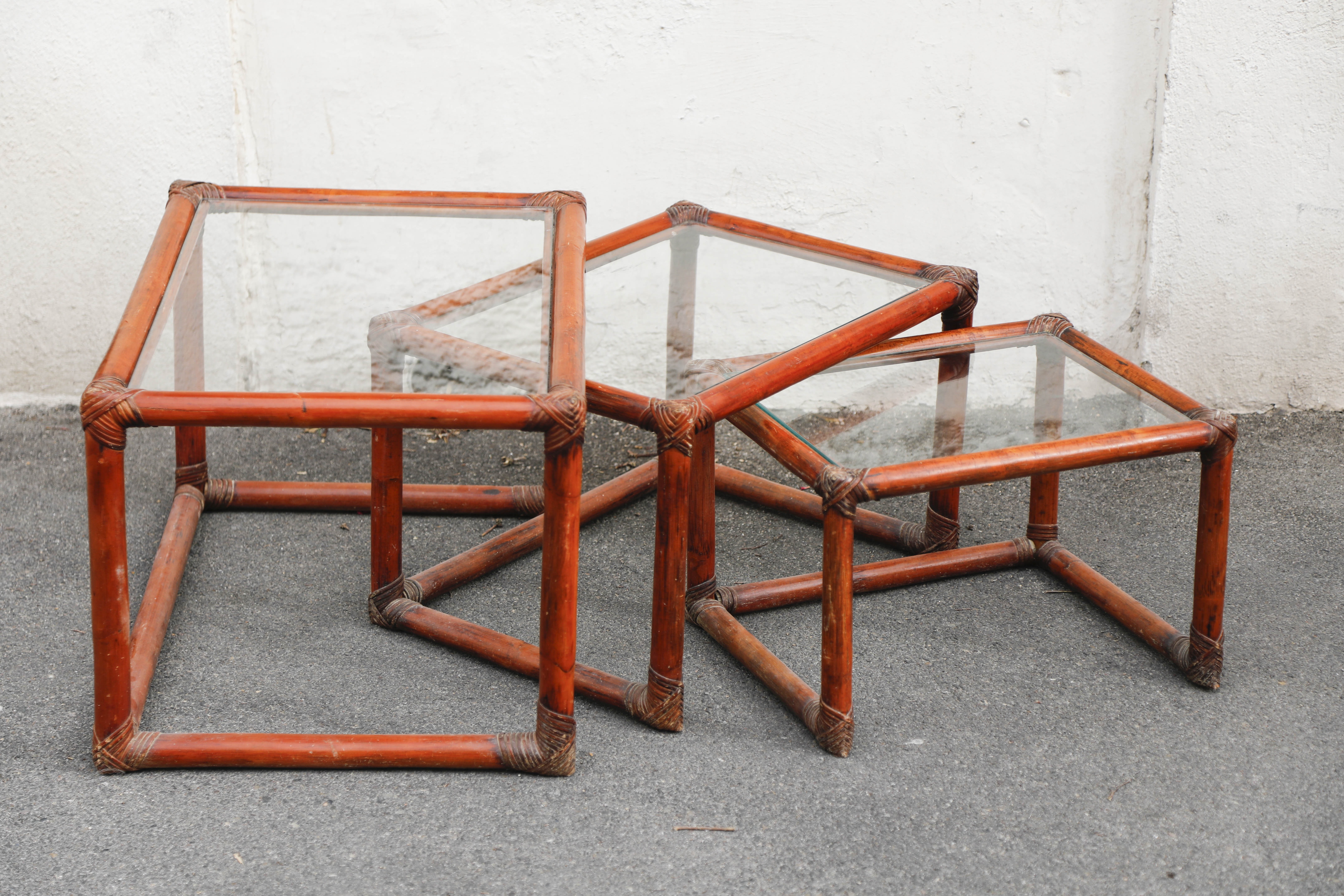 Rattan and glass side tables