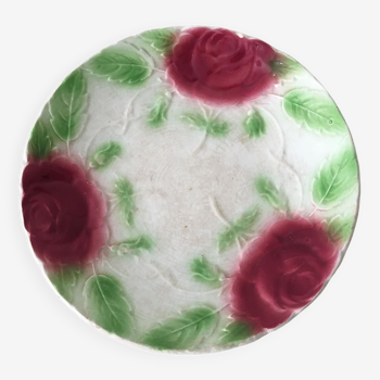 Old slip plate decorated with Majolica roses