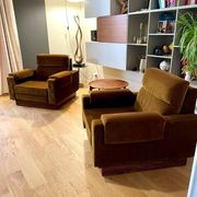 Paire de fauteuils vintage en velours et palissandre