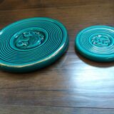 Emerald green coaster with duck pattern
