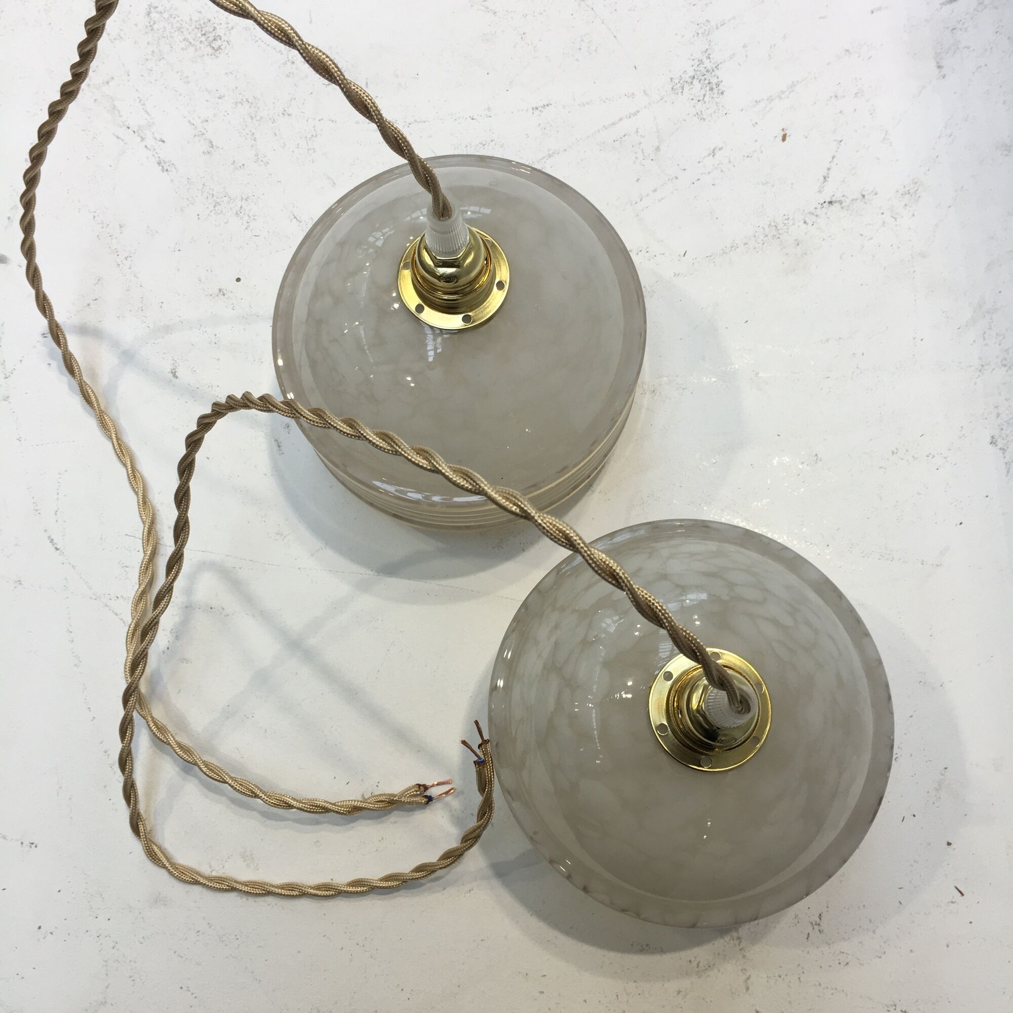 Pair of Art Deco ball suspensions in white Clichy glass