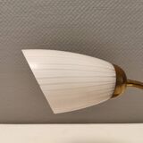 Beautiful table lamp, estimated from the 1950-60s. Made of metal, brass and glass.