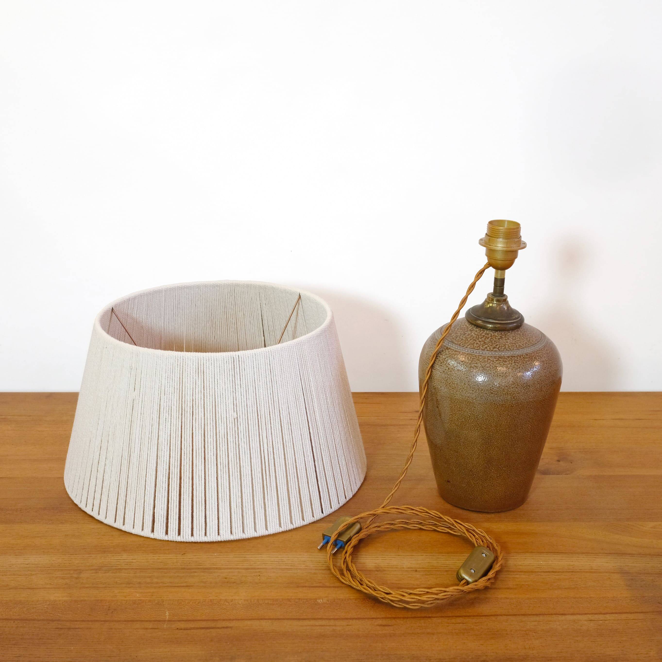 Stoneware lamp with a cotton thread shade, 1970s.