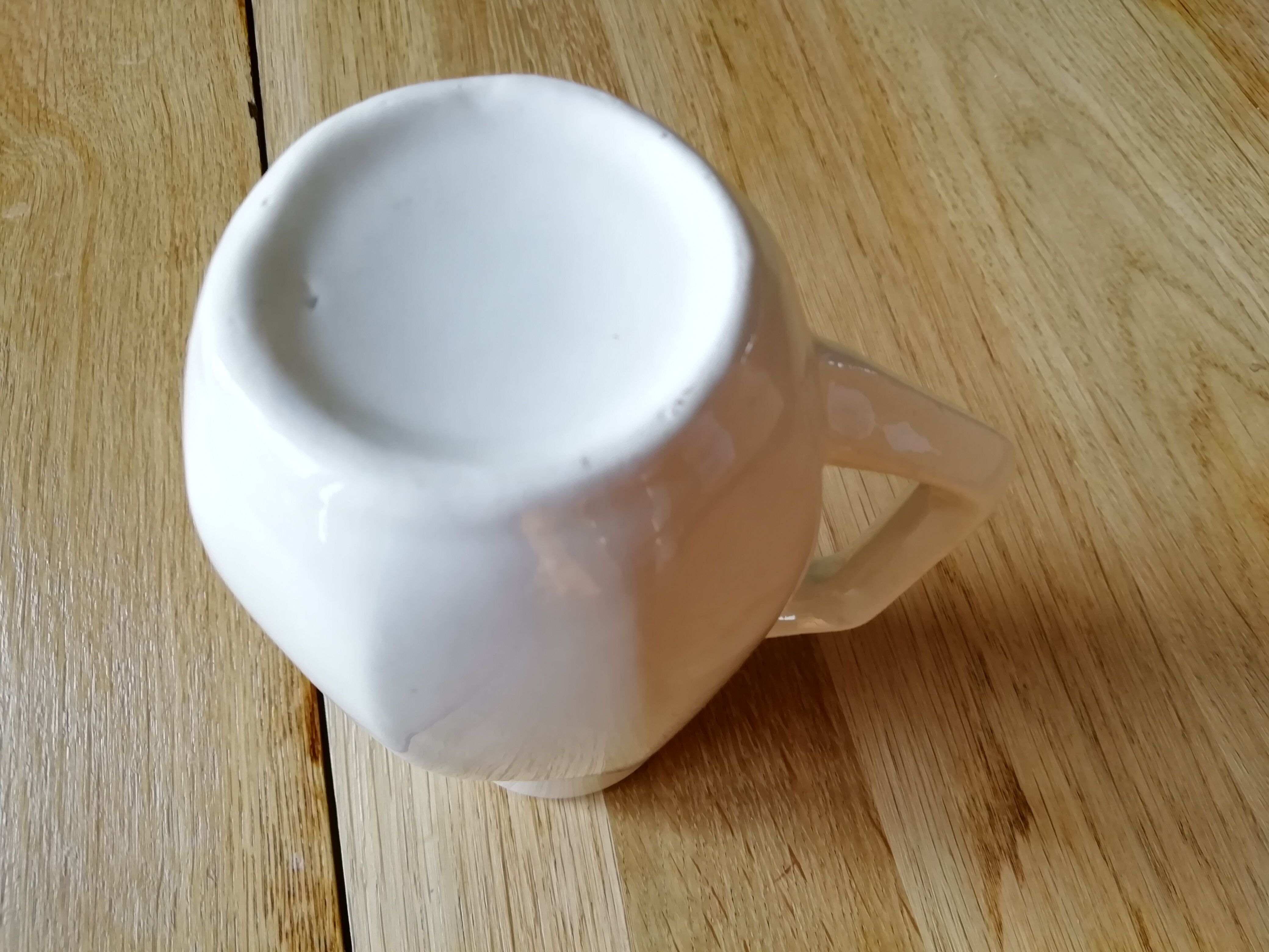 White porcelain milk pot