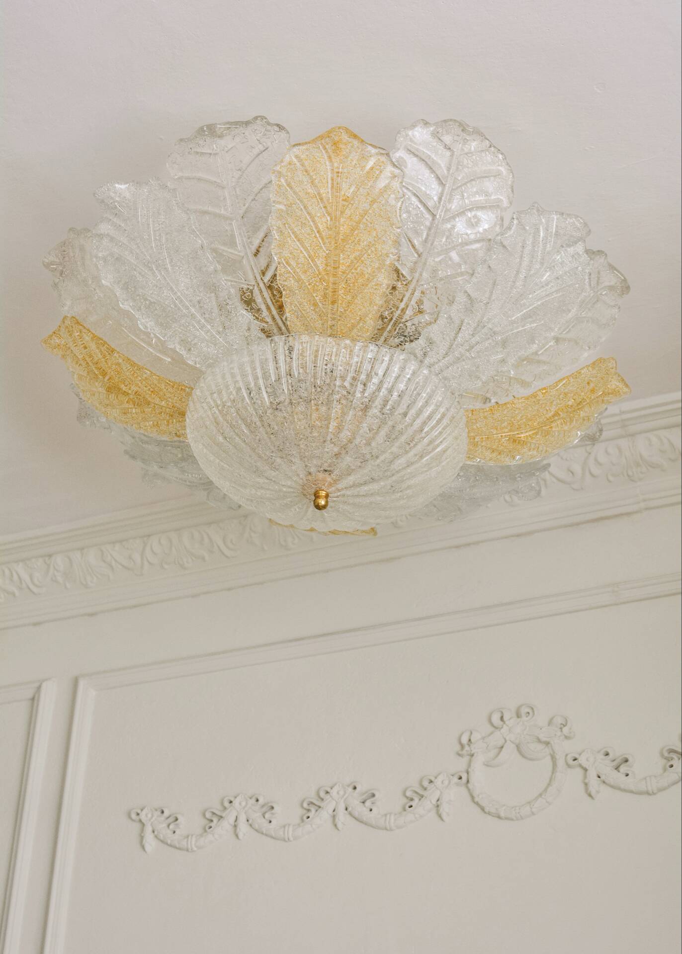 Vintage Murano chandelier/ceiling light with 16 white and amber leaves.