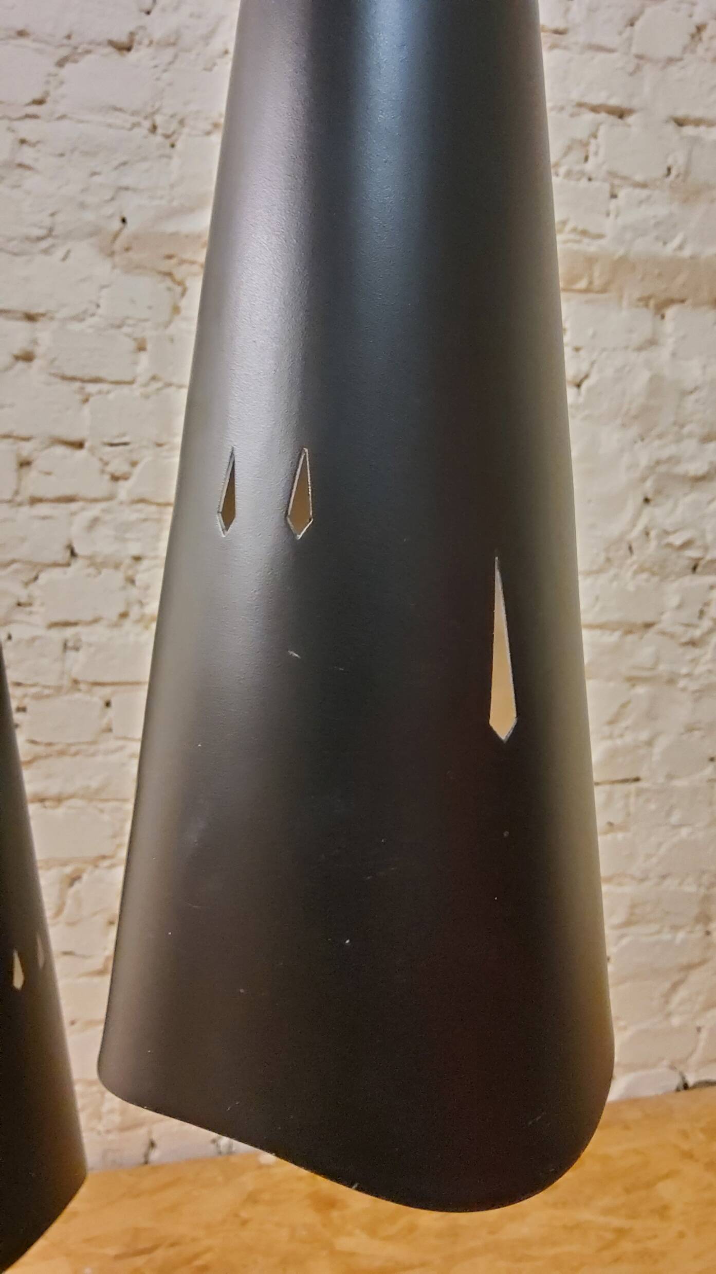 Vintage perforated metal suspensions