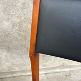 2 wooden and faux leather chairs in Scandinavian style